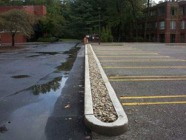 subway parking lot made of pervious concrete has no puddles
